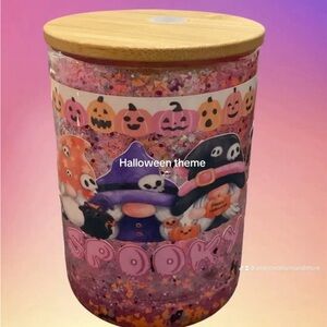 10 oz Halloween snow globe glass mug. Comes with straw and lid.
